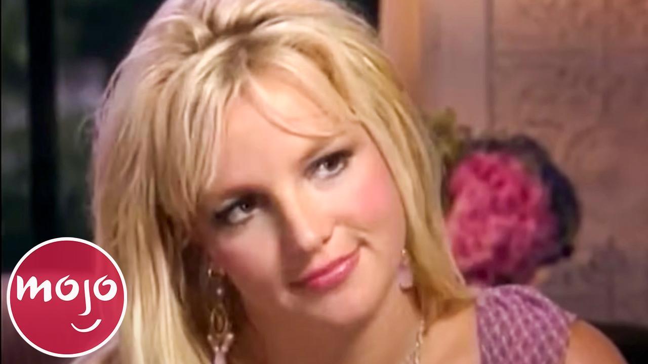 Britney Spears pushes her boobs together in tiny top and pulls her